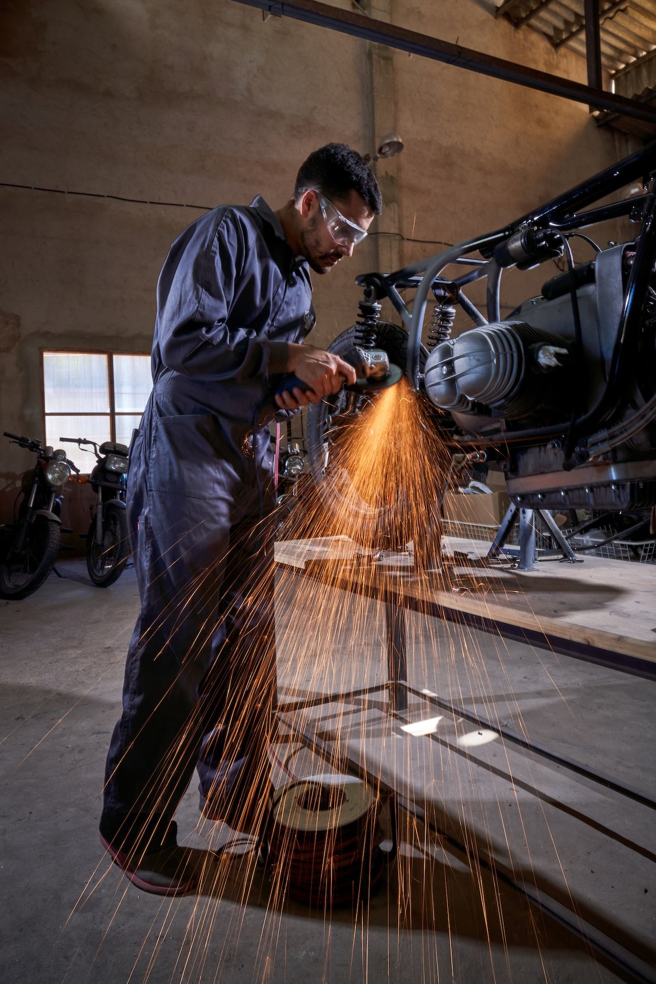male mechanic repairing motorbike in garage 2025 04 04 15 18 43 utc